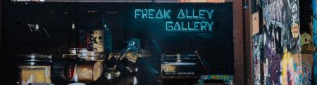 image of freak alley gallery where artists create art in the alley.