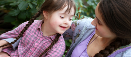 Downs syndrome child with mother