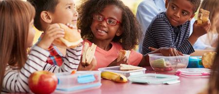 Children eating lunch at school