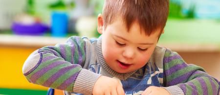 A child playing with a puzzle 