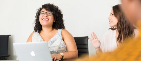 Laughing people in an office setting