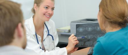 Doctor consulting with patients