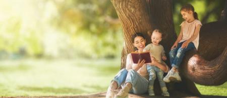 Mother reading to children