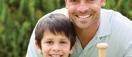 Cover of the 2026-2029 DHW Strategic plan featuring a father and son playing baseball in a park.