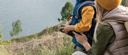 Cover of the SFY 2027-2030 Strategic Plan with a woman and her young son hiking near a lake