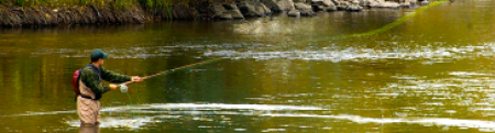 man fly fishin in the Boise River