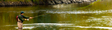 man fly fishin in the Boise River