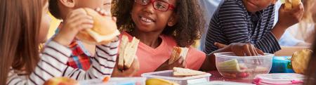 Children eating lunch at school