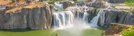 A distant view of a gorge and waterfall in Idaho