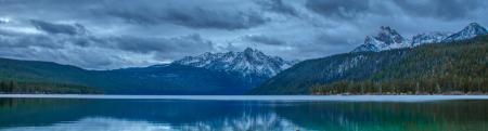 Wintry view of a lake and mountains