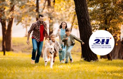 Image of logo with family and dog running in a woody area.