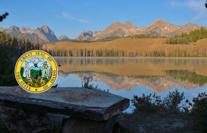 Beautiful lake in Idaho with the Idaho State Seal on the left and side.