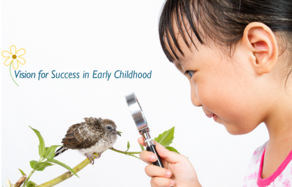 Banner with little asian girl looking through a magnifying glass at a little bird.