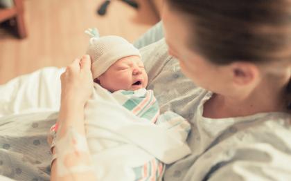 New mother in hospital with baby