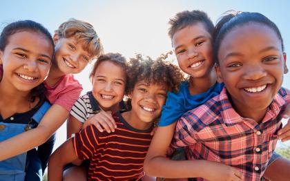 A group of laughing smiling children