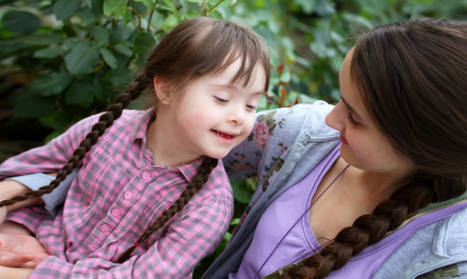 Downs syndrome child with mother