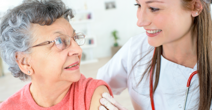 Elderly woman getting vaccinated