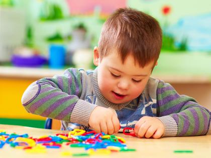 A child playing with a puzzle 
