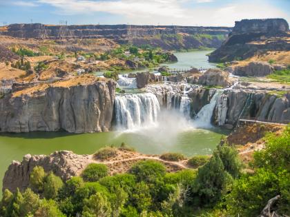 A distant view of a gorge and waterfall in Idaho