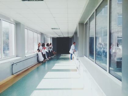 Medical professionals in a hospital hallway
