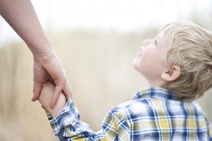Child holding hand
