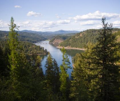 Coeur d Alene Lake and North Idaho Mountains with blue sky partly cloud