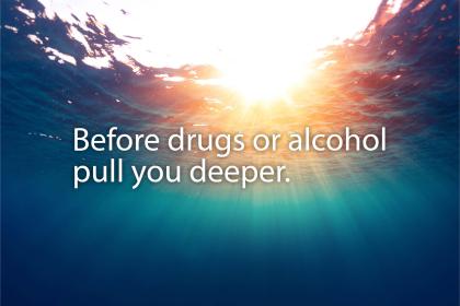 Banner with background of deep water with sun shining through the surface with words "Before drugs or alcohol pull you deeper."