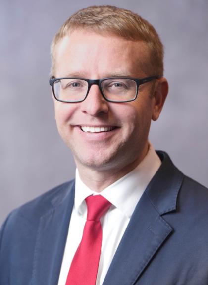 Director Alex J. Adams