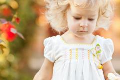 Little girl walking in park